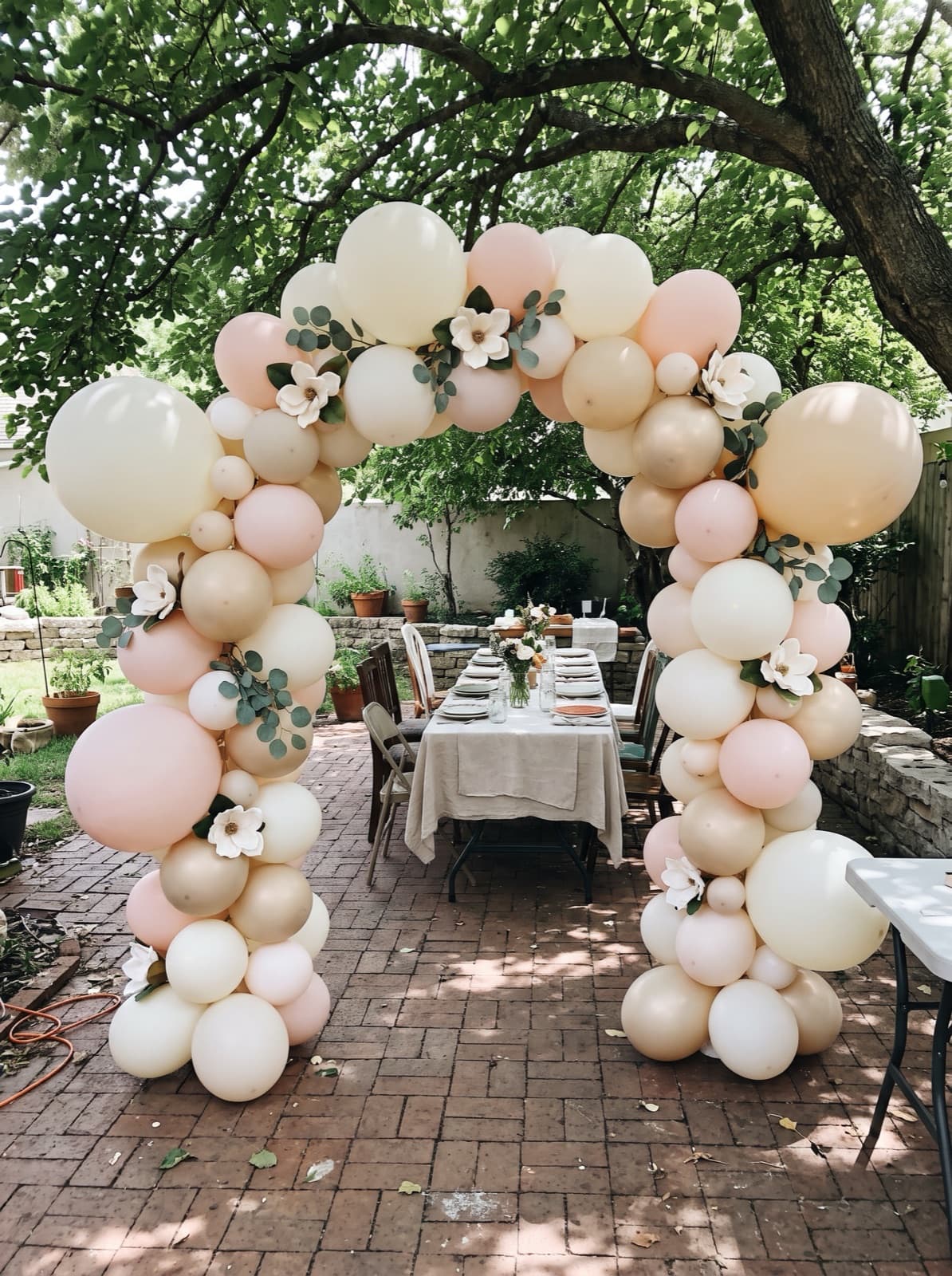 Floral balloon arch with greenery for a bridal shower