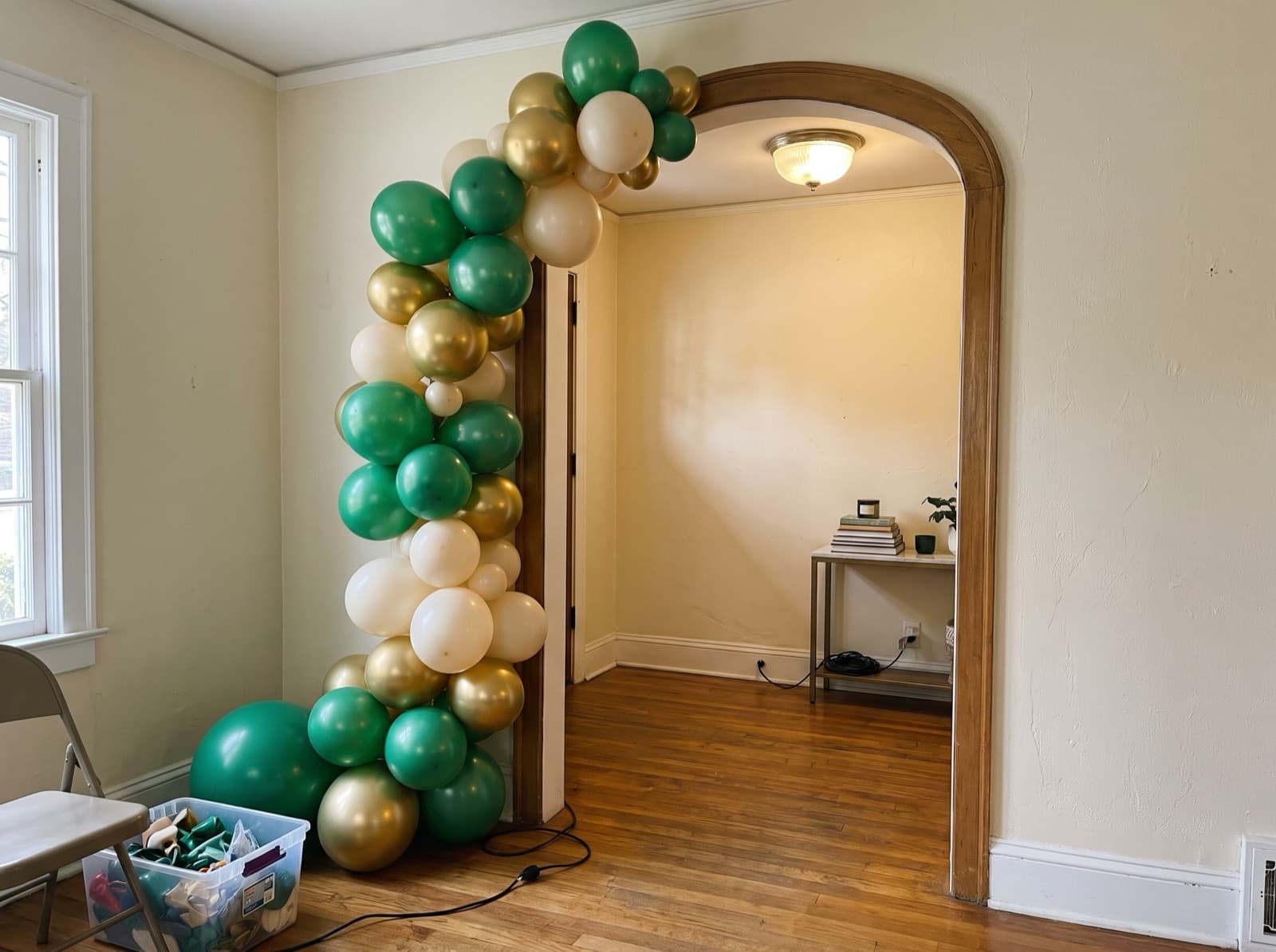 Balloon garland around an interior arched doorway