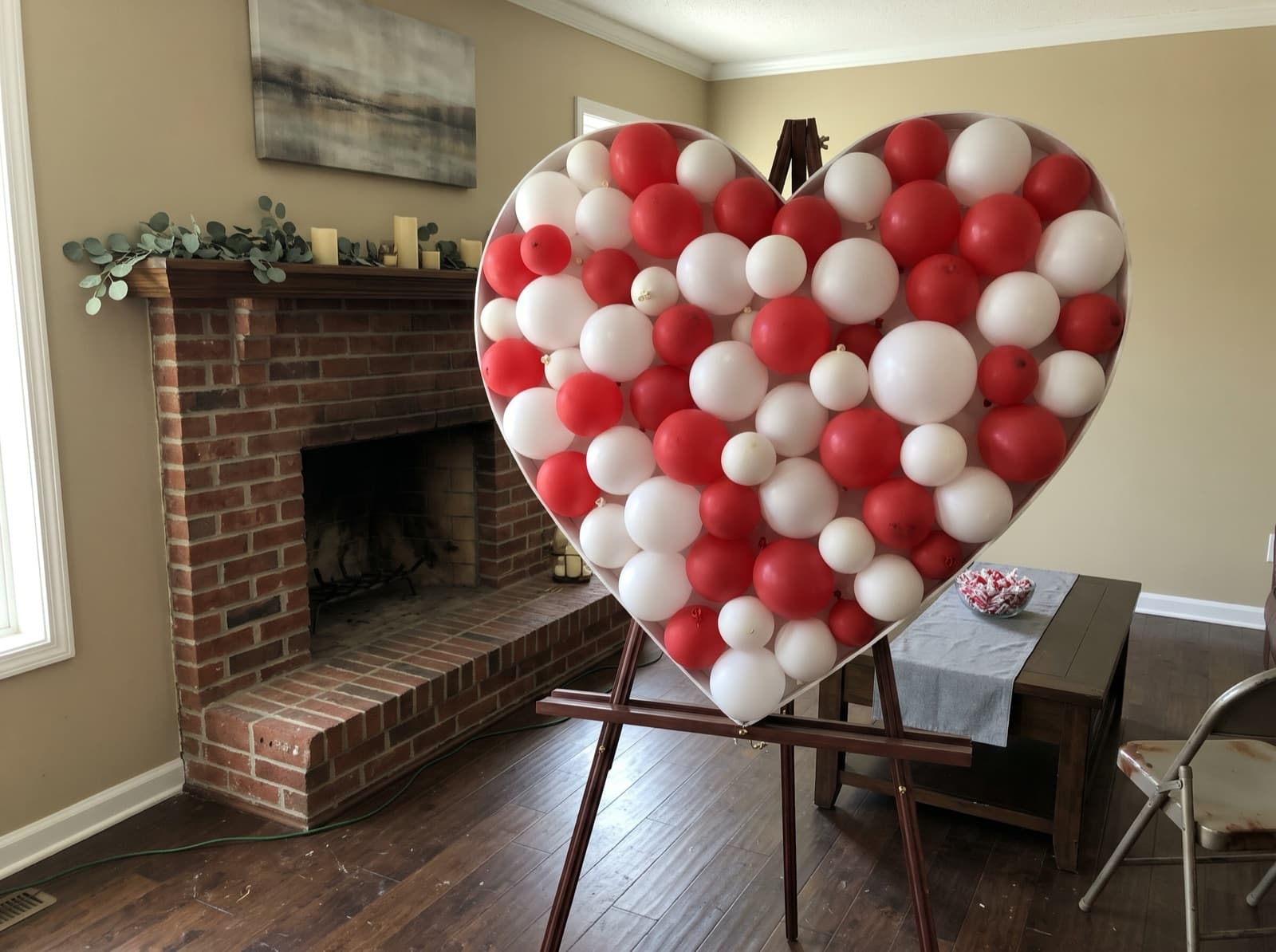 Heart-shaped balloon mosaic in red and white